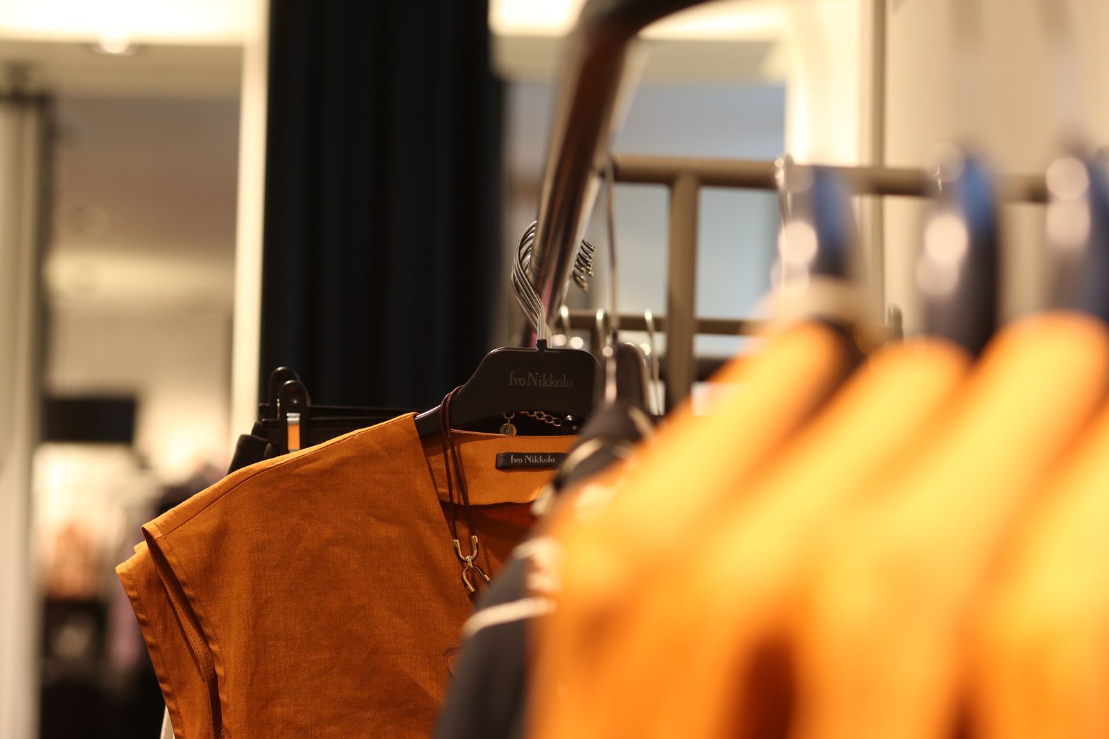 Pressed garments on hangers, prepared with care in our Islington workshop